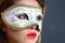 Brunette with mask closeup
