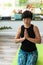 Brunette middle aged woman doing yoga meditation on exercise mat at home, mental health. Peaceful woman meditate, mental