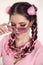 Brunette teen girl braided with two french braids from pink kane