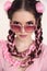 Brunette teen girl with two french braids from pink kanekalon, f