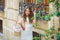 Brunette tourist kid girl in mediterranean white town