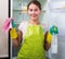 Brunette washing fridge