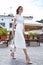 Brunette woman fashion style street look elegant walk cafe