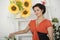 Brunette woman with sunflowers