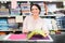 Brunette woman in textile shop