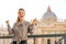 A brunette woman touring Vatican City