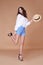 brunette woman wear short blue cotton short and silk summer