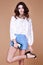 brunette woman wear short blue cotton short and silk summer