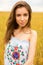 Brunette woman on wheat field