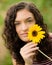 Brunetter high school senior girl with sunflower