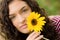 Brunetter high school senior girl with sunflower