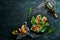 Bruschetta with avocado paste, tomatoes, onions and spinach.