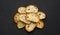 Bruschetta crackers, bread croutons on black background, top view