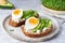 Bruschetta with egg and microgreens