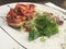 Bruschetta with green lettuce and balsamic vinaigrette