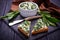 Bruschetta with ramson salad on slate background