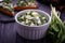 Bruschetta with ramson salad on slate background