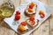 Bruschetta with ricotta cheese and sun-dried tomatoes with provencal herbs.