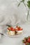 Bruschetta with Ricotta, Strawberries, and Mint on light Background. Comfort Food