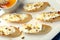 Bruschetta sandwich with goat cheese honey and pistachios