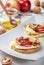 Bruschetta sandwiches with brie or Camembert cheese, apples, walnuts and honey