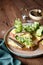 Bruschetta with sprats, egg and cucumber