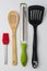 Brush Spoon Spatula Zester on White Background Top View