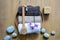 Brush, towels, orchids and eco-friendly soap over zen stones