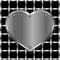 Brushed metal heart on a perforated background