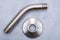 Brushed Nickel Metal Shower Arm and Flange isolated on gray