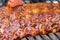 Brushing Barbecue Sauce on a Rack of Baby Back Rib