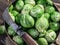 Brussel sprouts in the copper pan on the old wooden table