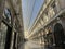 Brussels, Belgium, April 25, 2020 - inside the empty luxury glazed shopping arcade Les Galeries Royales Saint-Hubert during the