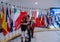 Brussels, Belgium, August 2019. At the headquarters of the European Parliament: the flags of the member states. An Italian mom