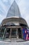 Brussels, Belgium - Round shaped entrance of a Retail shop and the headquarters of the contemporary Proximus building