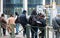 Brussels Business district, Brussels Capital Region - Belgium - Group of mixed race waiting for the tram at the public