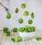 Brussels sprouts flying over a bowl. Fresh Brussels sprouts. Levitation concept