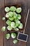 Brussels sprouts over rustic wooden background