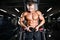 Brutal bodybuilder powerful training arms, pectorals and shoulde