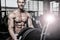 Brutal caucasian handsome fitness men on diet training chest pumping