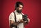 brutal guy photographer wear bow tie. elegant male hold retro camera. handsome hipster making vintage photo. mature