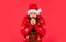 Brutal man red background. christmas online shopping. winter holiday party. mature guy celebrate new year. cold man with