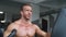 Brutal strong bodybuilder athletic men pumping up muscles with dumbbells