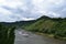 Bruttig-Fankel, Germany - 08 06 2021: passenger ship below a huge vineyard mountain