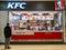 Bryansk, Russia - December 25, 2019: Male buyer examines a window in a KFC store