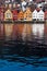 Bryggen houses, Bergen, Norway - November 2019. Old, wooden hasnaetic houses of Bryggen reflected in water