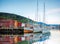 Bryggen street with boats in Bergen, UNESCO World Heritage Site, Norway