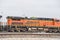 BSNF train on freight railroad track at Fort Worth, Texas