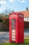 BT telephone box in a Suffolk Village, UK