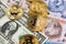 BTC Bitcoin cryptocurrency coins on Tanzania Shilling and US Dollar banknotes close up image. Africa Bitcoin